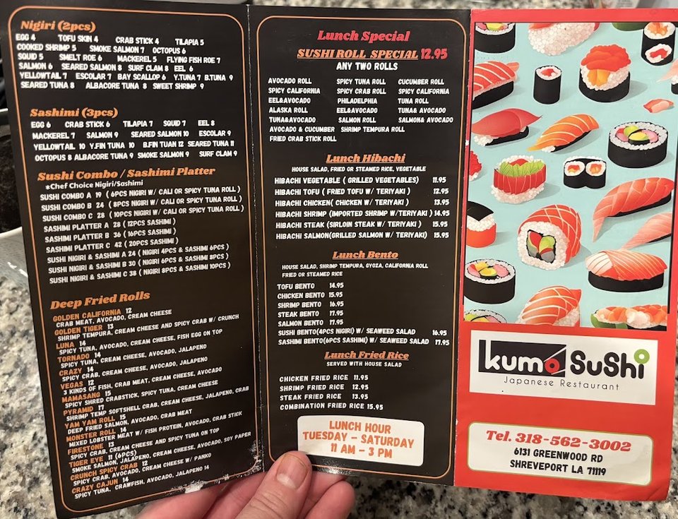 Printed menu with sushi roll and hibachi sections.